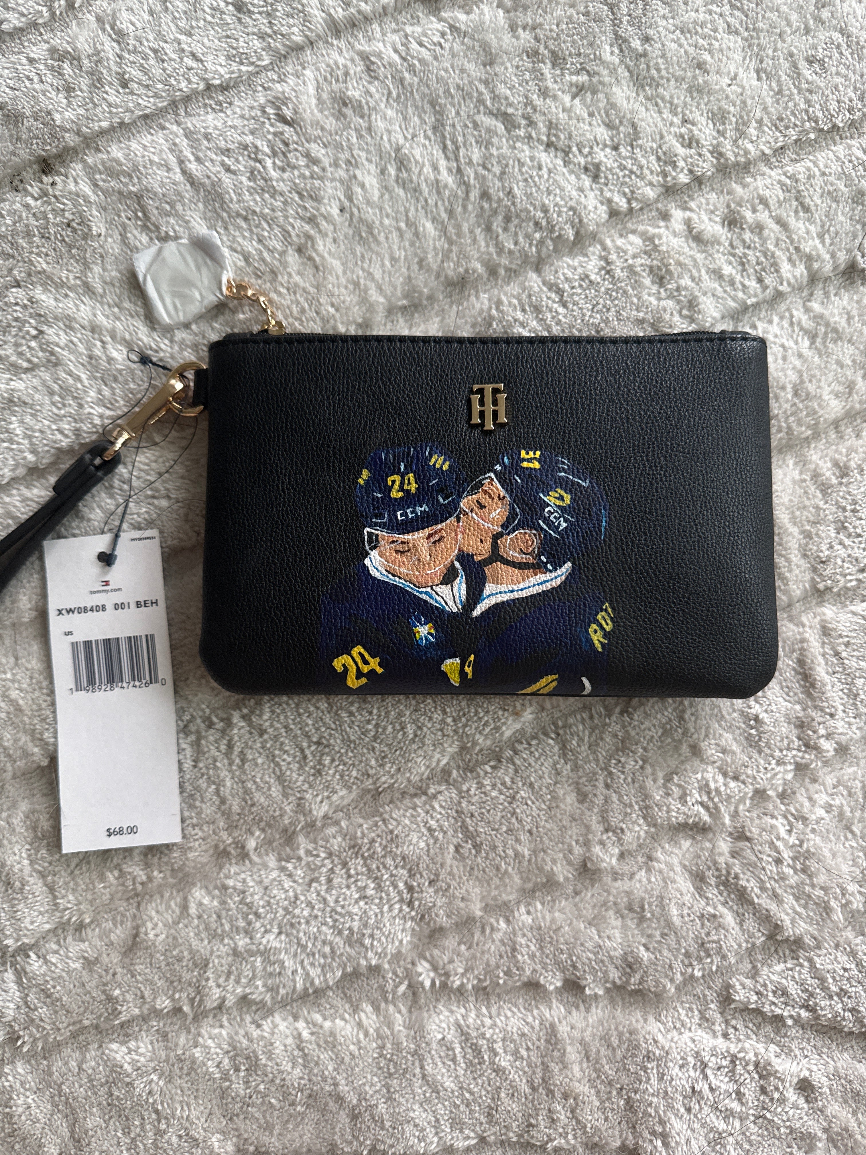 Custom heated rivalry  Wristlet